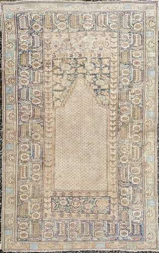 A Ghiordes prayer rug, West Anatolia, circa 1900, the mihrab...