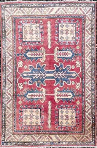 A Ziegler Chobi type rug, the red field with four large squa...