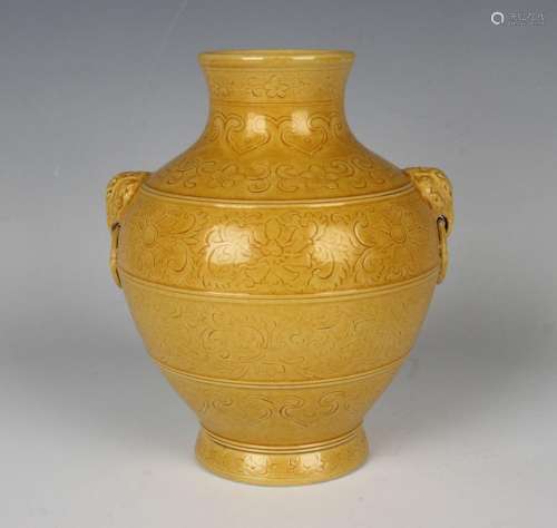 A Chinese yellow enamelled biscuit porcelain vase
