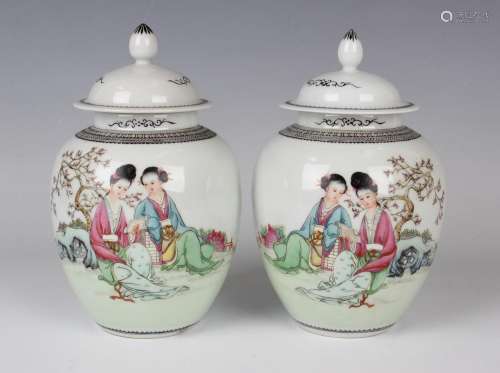 A pair of Chinese famille rose porcelain jars and covers