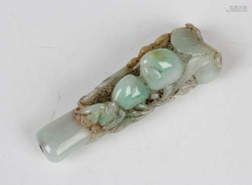 A Chinese mottled pale green jade cheroot holder