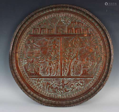 An Indian copper circular tray