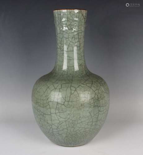 A Chinese celadon crackle glazed porcelain bottle vase