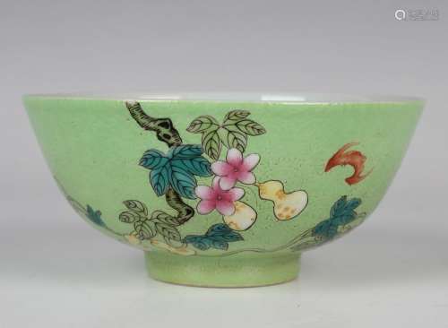 A Chinese famille rose lime green ground porcelain bowl