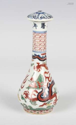 A Chinese Ming style wucai porcelain fly whisk handle