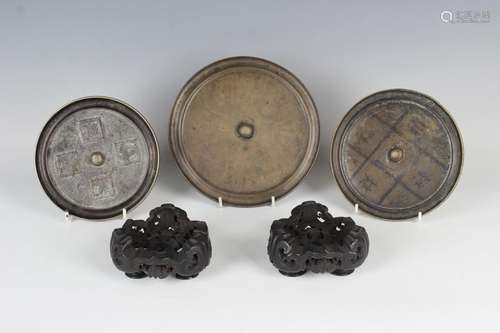 A pair of Chinese hardwood tripod censer stands