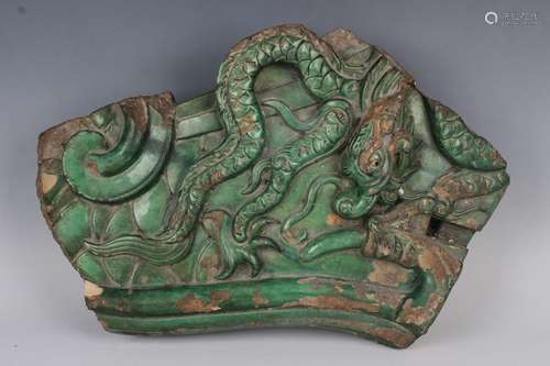 A Chinese Ming tilework green glazed architectural fragment