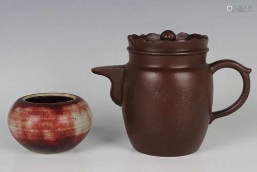 A Chinese Yixing stoneware teapot and cover