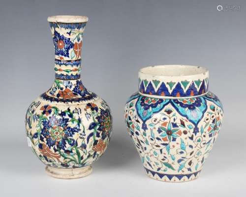 An Islamic Isnik style pottery vase of shouldered tapering f...