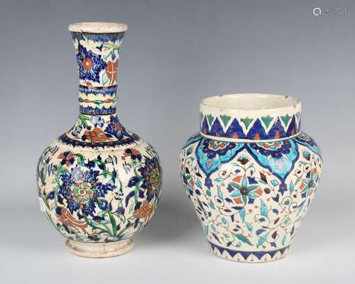 An Islamic Isnik style pottery vase of shouldered tapering f...