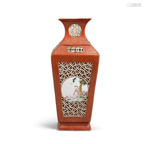 A CORAL-GROUND AND FAMILLE-ROSE-ENAMELED RETICULATED VASE Qi...