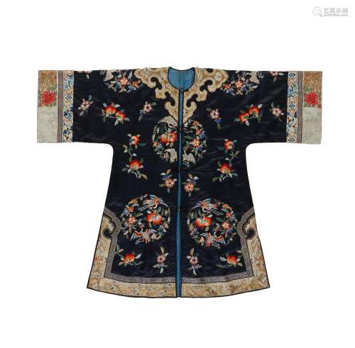 A NAVY-GROUND EMBROIDERED SILK LADY'S INFORMAL ROBE Late...