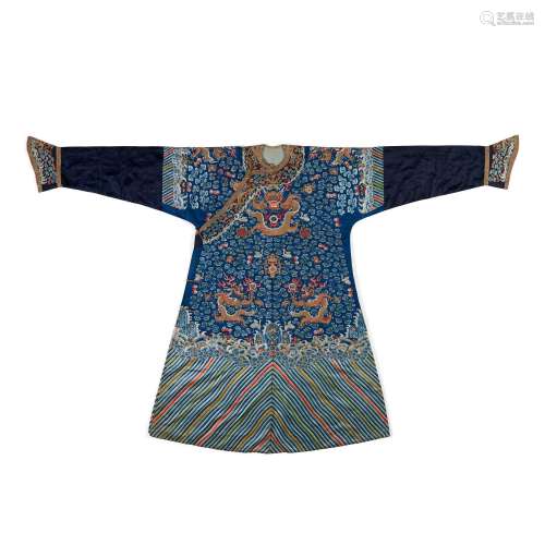 A BLUE-GROUND EMBROIDERED SILK 'DRAGON' ROBE Late Qi...