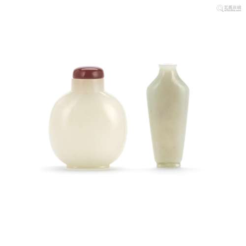 A WHITE JADE SNUFF BOTTLE AND A PALE GREEN JADE SNUFF BOTTLE...