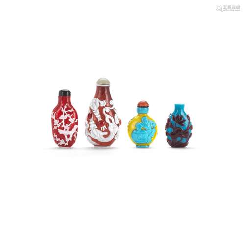 FOUR OVERLAY GLASS SNUFF BOTTLES Late Qing Dynasty