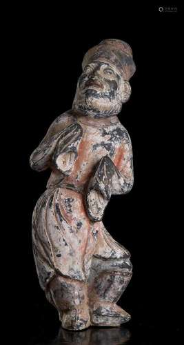 A PAINTED POTTERY FIGURE OF A BEARDED FOREIGNER
China, Tang ...