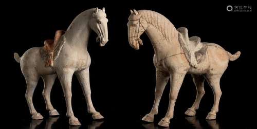 A PAIR OF PAINTED CERAMIC HORSES
China, Tang dynasty style