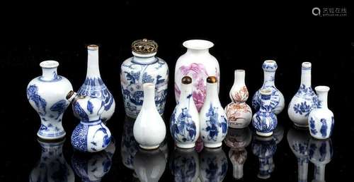 TWELVE PORCELAIN MINIATURE VASES
China, Qing dynasty