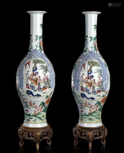 A PAIR OF LARGE AND IMPORTANT PORCELAIN VASES WITH POLYCHROM...