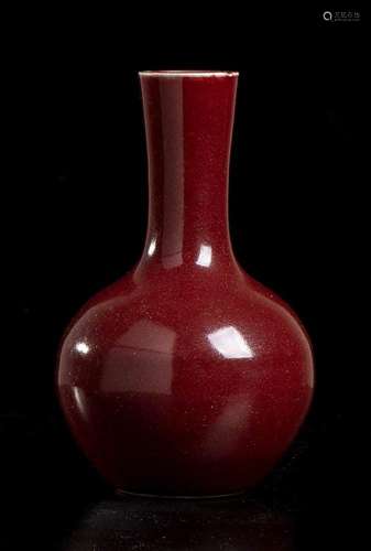 A 'SANG DE BOEUF' GLAZED PORCELAIN BOTTLE VASE
China, early ...