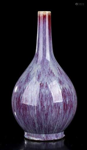 A FLAMBE GLAZED PORCELAIN BOTTLE VASE
China, 20th century