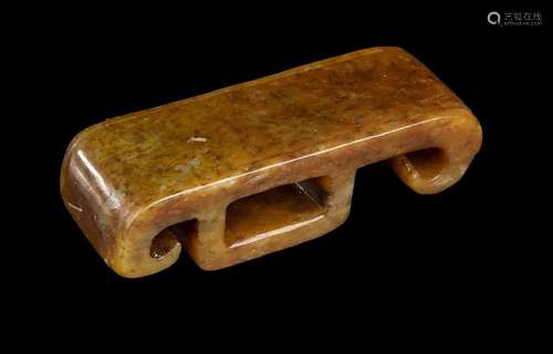 A BROWN JADE SCABBARD SLIDE  
China, probably Ming dynasty