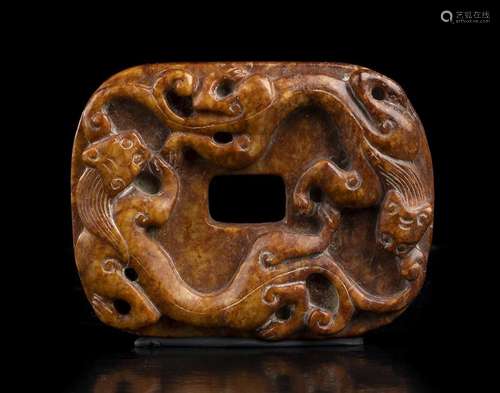 A BROWN JADE 'QILONG' PLAQUE  
China, 19th-20th century