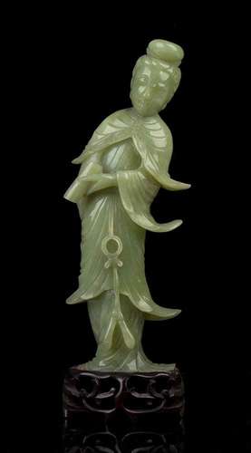 A GREEN STONE FEMALE FIGURE
China, 20th century