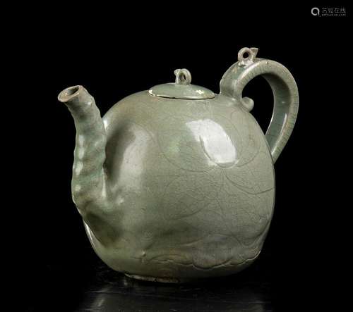 AN INCISED AND CÉLADON GLAZED CERAMIC EWER
Korea, Goryeo per...