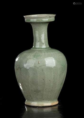 AN INCISED AND CÉLADON GLAZED CERAMIC BOTTLE VASE
Korea, Gor...