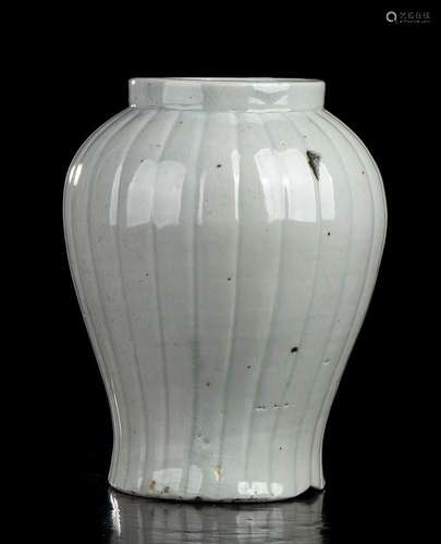 A GLAZED PORCELAIN BALUSTER VASE  
Korea, Joseon period, 18t...