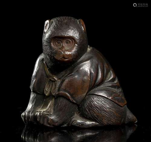 A SMALL BRONZE OKIMONO WITH A MONKEY
Japan, Meiji period