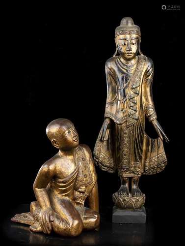 A GLASS INLAID LACQUERED AND GILT WOOD BUDDHA AND MONK
Burma...