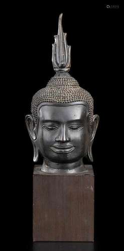 A BRONZE HEAD OF DEITY
Khmer style