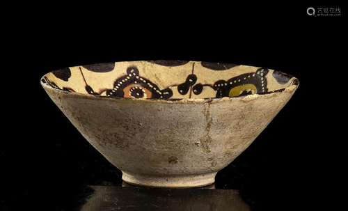 A PAINTED CERAMIC BOWL
Iran, 10th-11th century