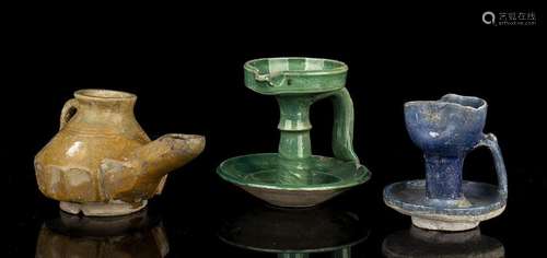 THREE GLAZED CERAMIC OIL LAMPS  
Iran