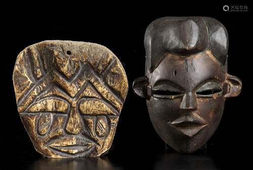 A WOOD MASK AND A BONE MASK
Africa