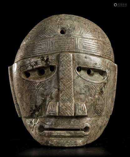 A LARGE STONE MASK
Pre-columbian style