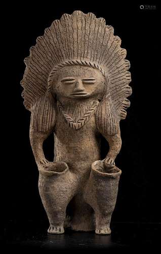 A POTTERY FIGURE
Pre-columbian style