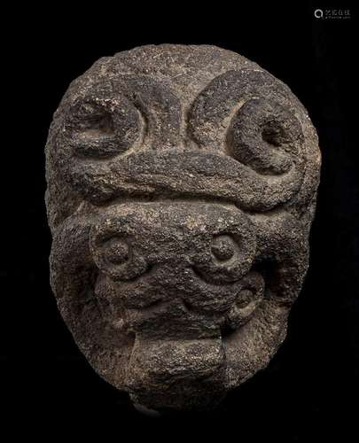 A STONE JAGUAR HEAD
Pre-columbian style