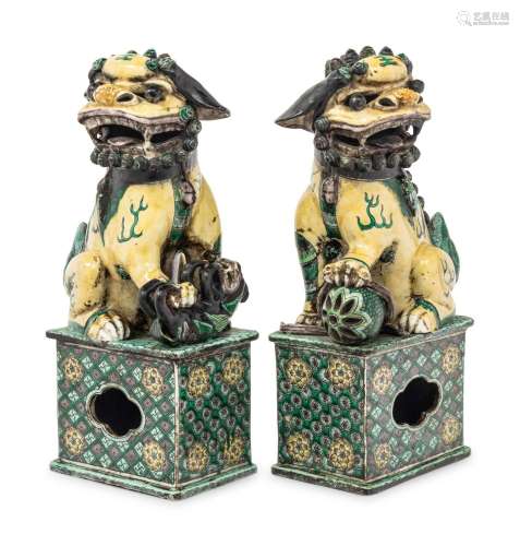 A Pair of Chinese Famille Verte Porcelain Figures of Fu Lion...