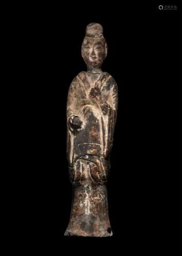 A Chinese Pottery Figure of a Standing Scholar