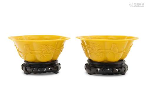 A Pair of Chinese Carved Opaque Yellow Glass Bowls