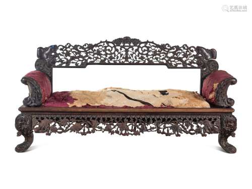 A Chinese Export Carved Hardwood Sofa
