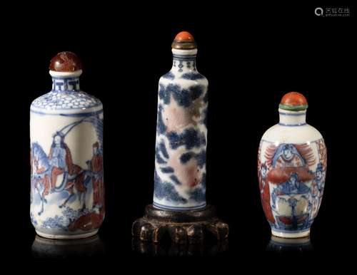 Three Chinese Copper Red and Underglaze Blue Porcelain Snuff...