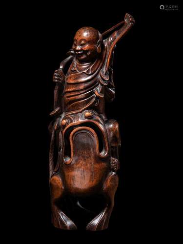 A Chinese Bamboo Figural Group of Immortal Liu Hai and Three...