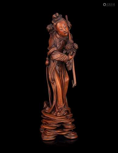 A Chinese Boxwood Figure of a Female Immortal