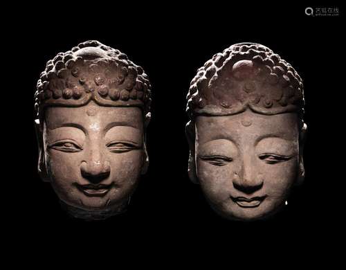 A Pair of Chinese Carved Stone Heads of Buddha