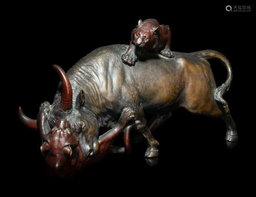 A Japanese Bronze Okimono of Two Tigers and A Bull