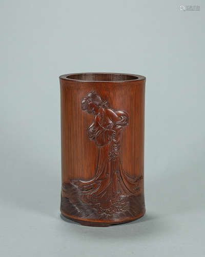 A figure carved bamboo brush pot